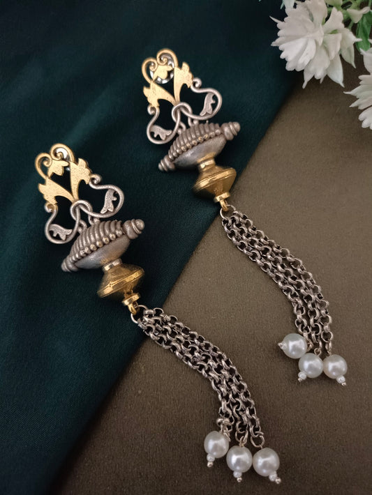 Sanjog Dual-Tone Antique Tribal Drop Earrings with Temple Motifs and Chain Tassels