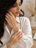 Set Of 2 Gold-Plated Kundan Studded Finger Ring Hathphool Pearl Bracelets