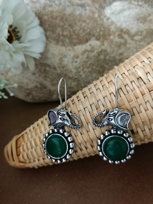 Sanjog Oxidized Silver Elephant Head Drop Earrings with Emerald Green Stone