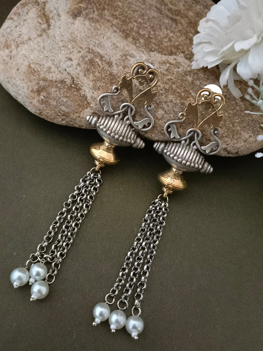 Sanjog Dual-Tone Antique Tribal Drop Earrings with Temple Motifs and Chain Tassels