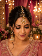Gold Plated Kundan Studded Chandbali Earrings and Maang Tiika Jewellery Set