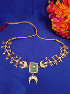 Sanjog Rajwadi Gold Plated Kundan Choker Necklace with Faux Gemstone, Crescent Moon Chaandbali Motifs, and Pearl Drops