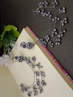 Sanjog Oxidized Silver Ear Chains (Kaan Chain) with Floral Pearl Studs and Tiered Ghungroo Bells