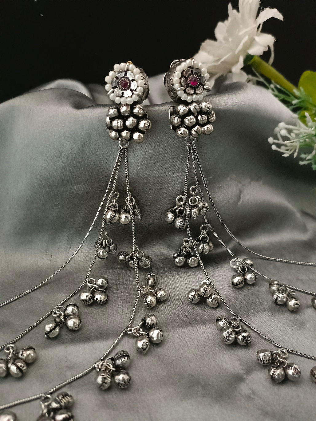 Sanjog Oxidized Silver Ear Chains (Kaan Chain) with Floral Pearl Studs and Tiered Ghungroo Bells