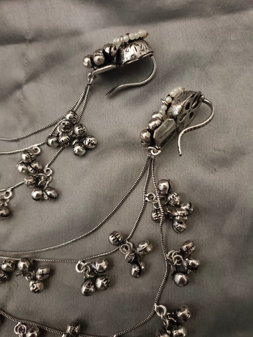 Sanjog Oxidized Silver Ear Chains (Kaan Chain) with Floral Pearl Studs and Tiered Ghungroo Bells