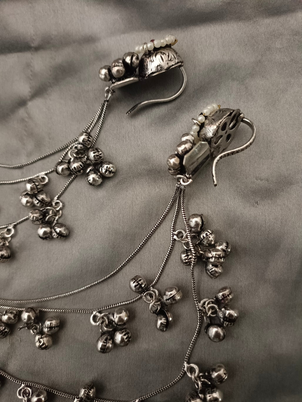 Sanjog Oxidized Silver Ear Chains (Kaan Chain) with Floral Pearl Studs and Tiered Ghungroo Bells