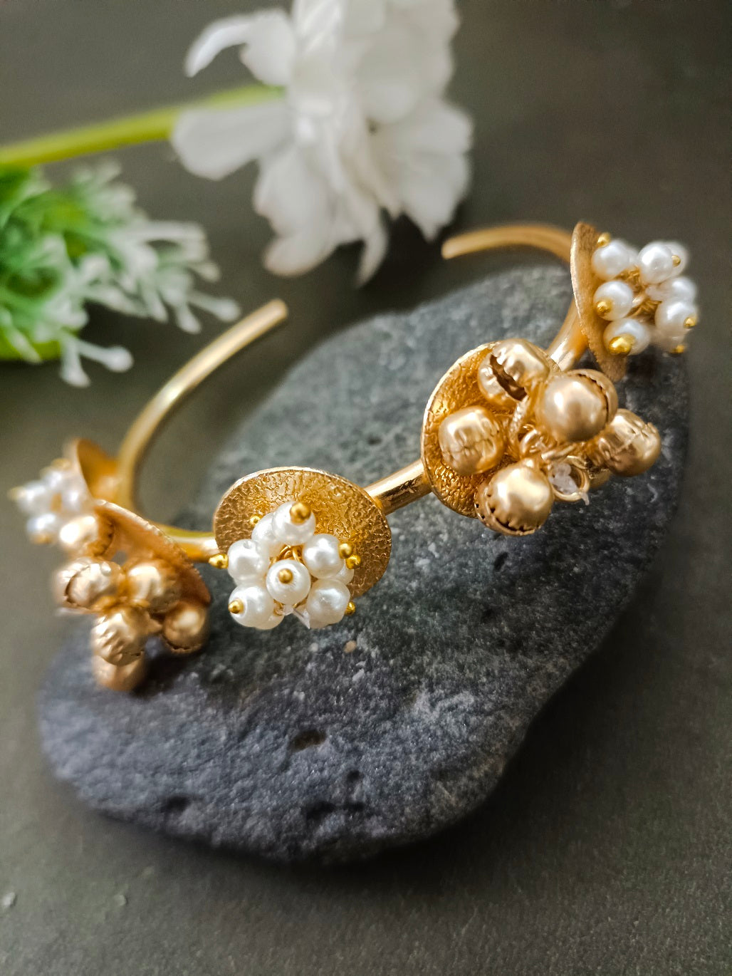Sanjog Modern Gold-Tone Open Cuff Bracelet with Pearl and Ghungroo Cluster Accents