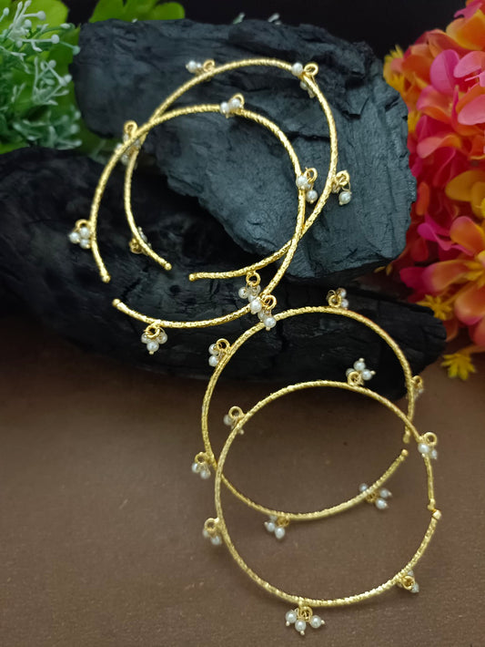 Set Of 4 Pearls Studded Gold-Plated Lightweighted Adjustable Bangle-Style Cuff Bracelet