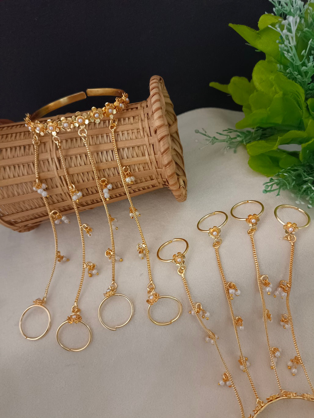 Women 2 Brass Handcrafted Gold-Plated Hathphool Panja Multi Ring Pearl Studded Bracelet