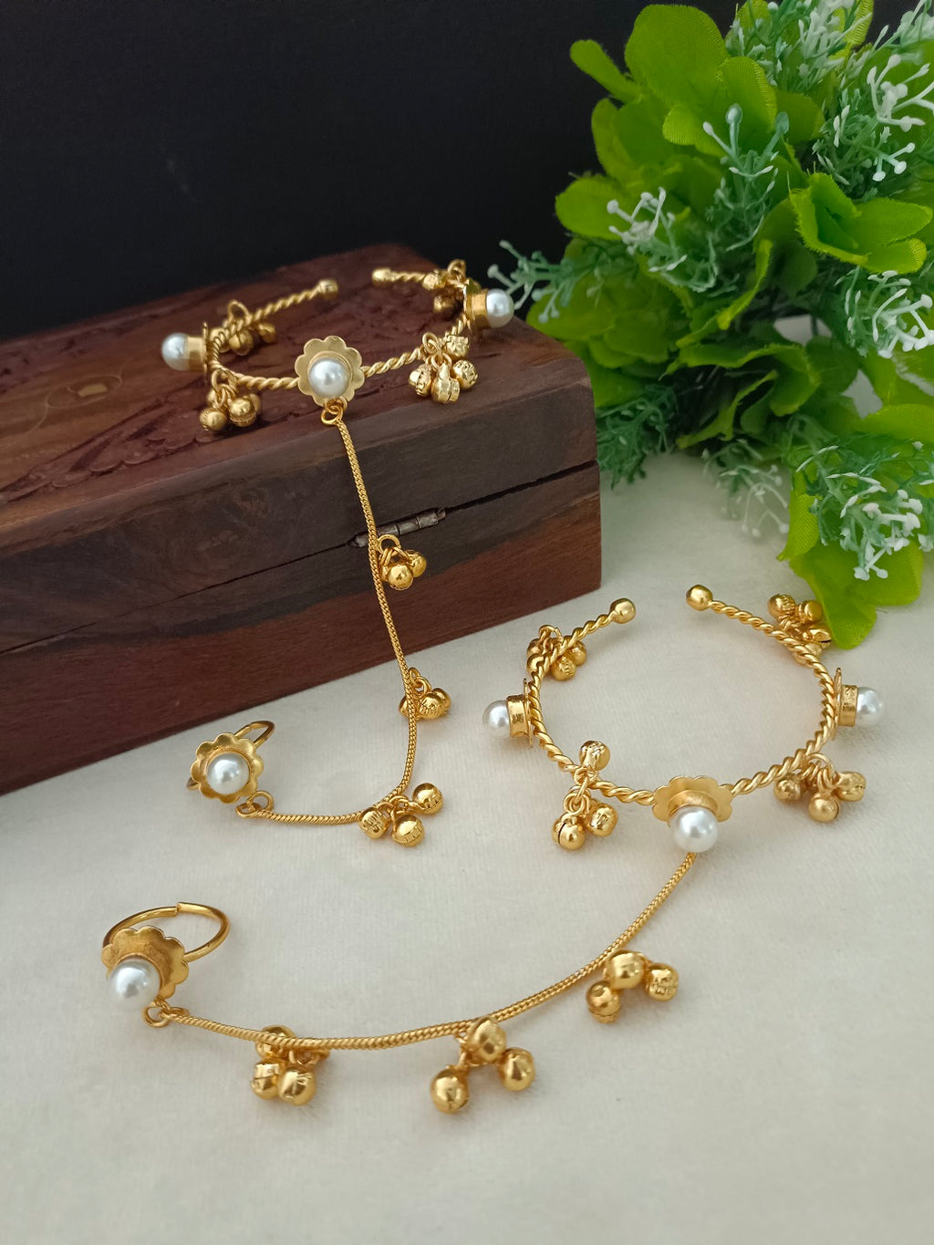 Women 2 Brass Handcrafted Gold-Plated Pearl Sudded Hathphool Panja Multi Ring Bracelet