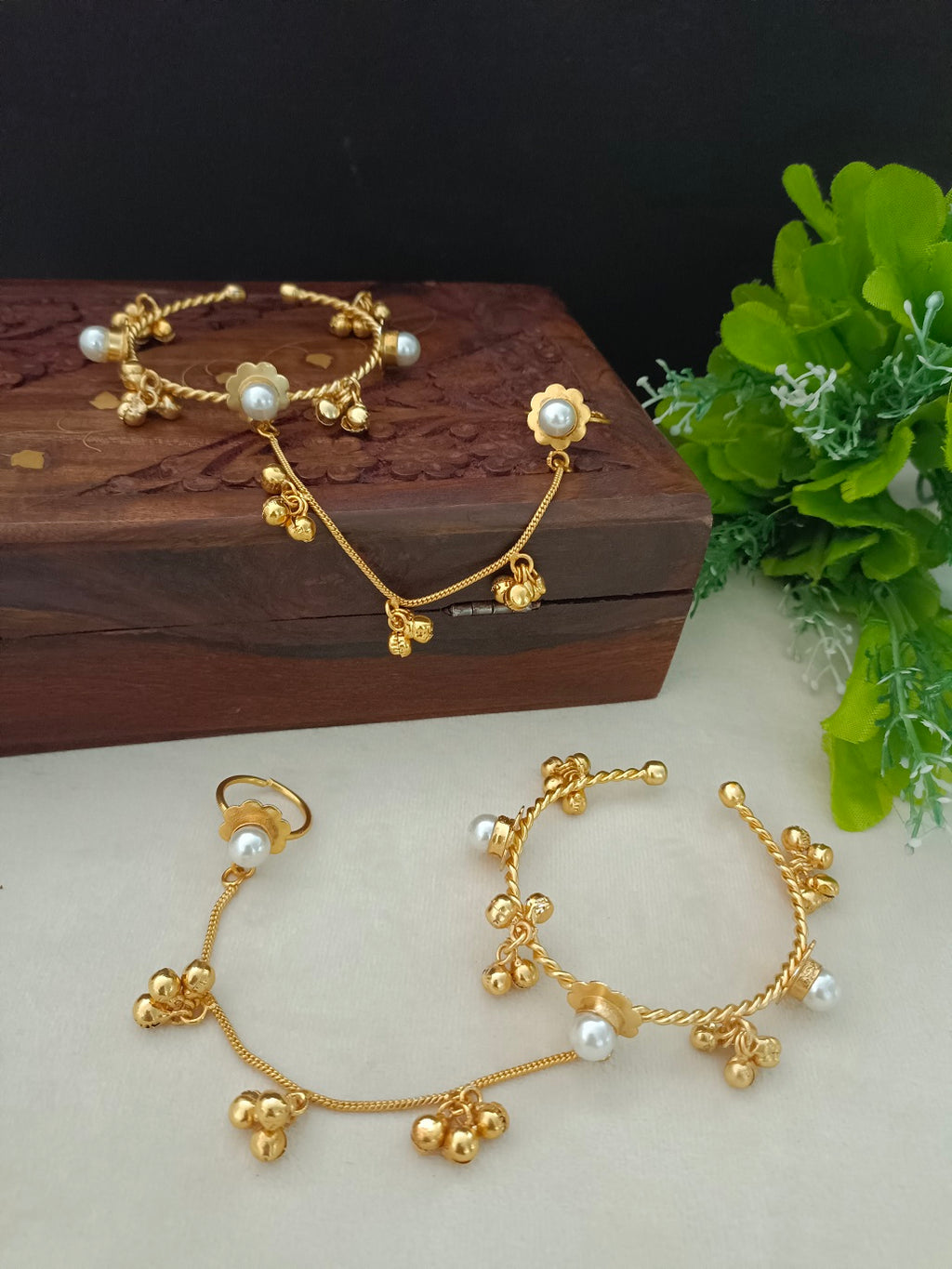 Women 2 Brass Handcrafted Gold-Plated Pearl Sudded Hathphool Panja Multi Ring Bracelet