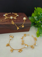 Women 2 Brass Handcrafted Gold-Plated Pearl Sudded Hathphool Panja Multi Ring Bracelet