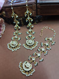 Gold Plated Kundan Studded Chandbali Earrings and Maang Tiika Jewellery Set
