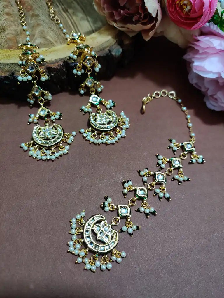 Gold Plated Kundan Studded Chandbali Earrings and Maang Tiika Jewellery Set
