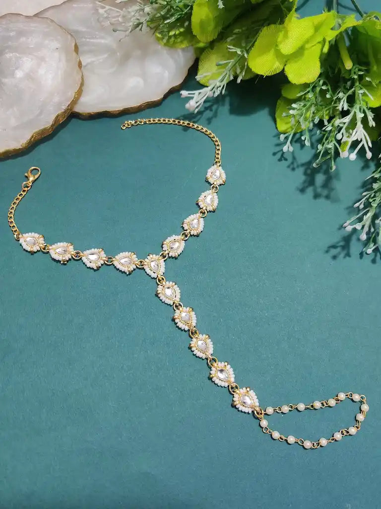 Set Of 2 Gold-Plated Kundan Studded Finger Ring Hathphool Pearl Bracelets